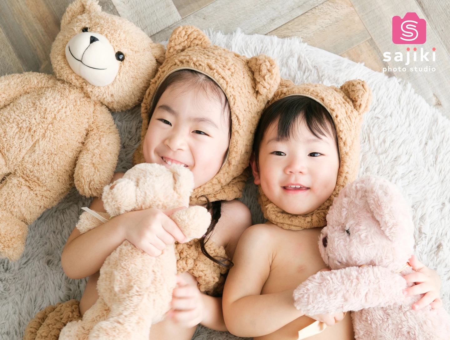 くまの着ぐるみで撮影した子どもの写真 14